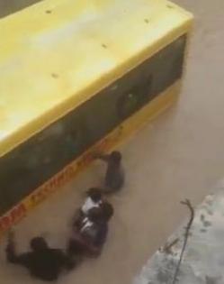 Telangana schoolchildren rescued after bus trapped in flood water | Telangana schoolchildren rescued after bus trapped in flood water Telangana schoolchildren rescued after bus trapped in flood water | Telangana schoolchildren rescued after bus trapped in flood water