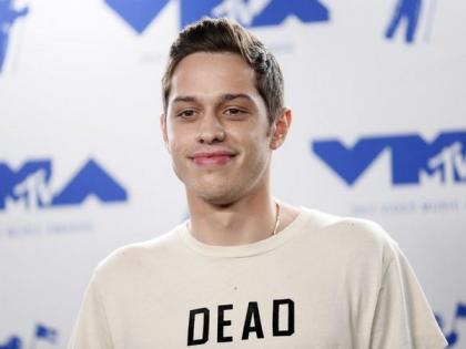 Pete Davidson meets John Mulaney's baby while sporting fake chipped tooth | Pete Davidson meets John Mulaney's baby while sporting fake chipped tooth