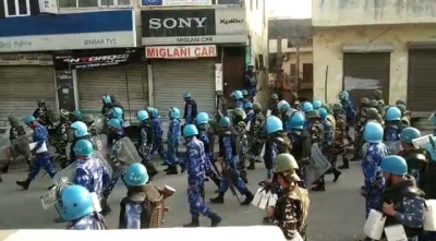 Security forces conduct flag marches in violence-hit Delhi areas | Security forces conduct flag marches in violence-hit Delhi areas Security forces conduct flag marches in violence-hit Delhi areas | Security forces conduct flag marches in violence-hit Delhi areas