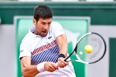 French Open: Djokovic advances, Muguruza crashes out | French Open: Djokovic advances, Muguruza crashes out
