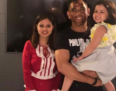 Sakshi shares video of Dhoni giving Ziva a bike ride at home | Sakshi shares video of Dhoni giving Ziva a bike ride at home