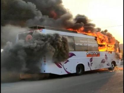 Narrow escape for 26 passengers as bus catches fire in Hyderabad | Narrow escape for 26 passengers as bus catches fire in Hyderabad Narrow escape for 26 passengers as bus catches fire in Hyderabad | Narrow escape for 26 passengers as bus catches fire in Hyderabad