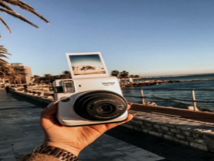Fujifilm introduces new film-digital hybrid Instax Mini Evo camera | Fujifilm introduces new film-digital hybrid Instax Mini Evo camera