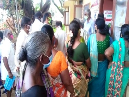 Huge rush for Covid vaccine registration at primary healthcare centre in AP's Veeravalli | Huge rush for Covid vaccine registration at primary healthcare centre in AP's Veeravalli
