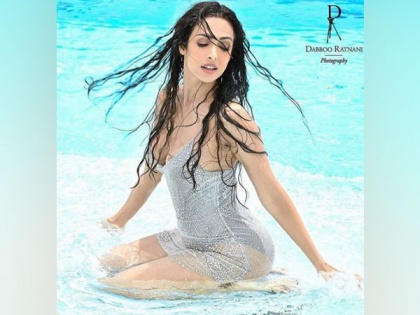 Malaika Arora shares sultry pool picture from Dabboo Ratani photoshoot | Malaika Arora shares sultry pool picture from Dabboo Ratani photoshoot