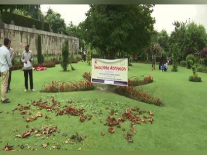 School girls take part in cleaning drive at Mughal gardens in J-K's Srinagar | School girls take part in cleaning drive at Mughal gardens in J-K's Srinagar