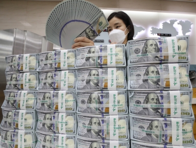 S.Korea's foreign currency trading hits record high in 2021 | S.Korea's foreign currency trading hits record high in 2021 S.Korea's foreign currency trading hits record high in 2021 | S.Korea's foreign currency trading hits record high in 2021