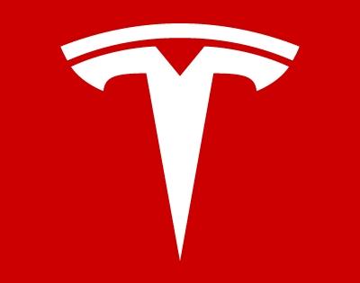 Tesla shares surpass record $1,000 mark for first time | Tesla shares surpass record $1,000 mark for first time