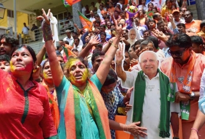 BJP workers, supporters revel in bypoll victory | BJP workers, supporters revel in bypoll victory