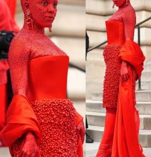 Doja Cat covered in red paint & 30,000 crystals for Paris Fashion Week | Doja Cat covered in red paint & 30,000 crystals for Paris Fashion Week