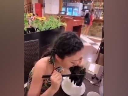 Twitter video of Chinese woman munching on a bat leaves people in shock | Twitter video of Chinese woman munching on a bat leaves people in shock