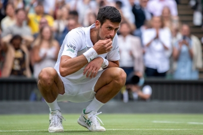 Wimbledon: Djokovic celebrates triumph by eating grass again | Wimbledon: Djokovic celebrates triumph by eating grass again
