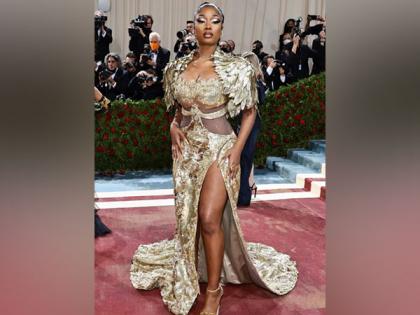Megan Thee Stallion dons luxurious golden ensemble for her second Met Gala event | Megan Thee Stallion dons luxurious golden ensemble for her second Met Gala event