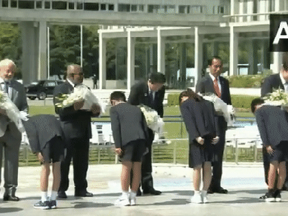 PM Modi, leaders of G7 invited countries, pay floral tribute at Hiroshima Peace Memorial in Japan | PM Modi, leaders of G7 invited countries, pay floral tribute at Hiroshima Peace Memorial in Japan