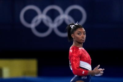 Fans divided over Simone Biles' withdrawal from floor exercise final | Fans divided over Simone Biles' withdrawal from floor exercise final