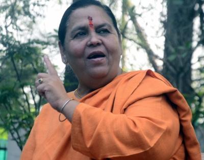 Uma Bharti trains her guns on Shivraj govt as liquor politics hots up in MP | Uma Bharti trains her guns on Shivraj govt as liquor politics hots up in MP Uma Bharti trains her guns on Shivraj govt as liquor politics hots up in MP | Uma Bharti trains her guns on Shivraj govt as liquor politics hots up in MP