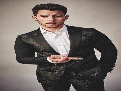Nick Jonas falls through hole on stage while performing | Nick Jonas falls through hole on stage while performing Nick Jonas falls through hole on stage while performing | Nick Jonas falls through hole on stage while performing
