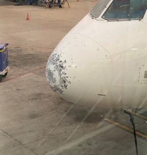Flight from Ahmedabad hit by hailstorm at Hyderabad airport | Flight from Ahmedabad hit by hailstorm at Hyderabad airport Flight from Ahmedabad hit by hailstorm at Hyderabad airport | Flight from Ahmedabad hit by hailstorm at Hyderabad airport