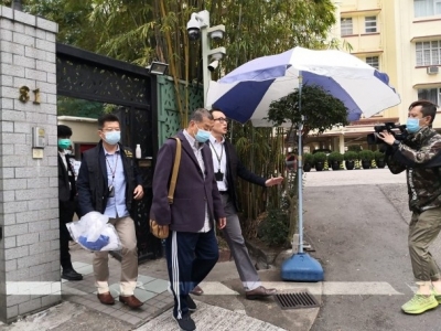 HK media mogul charged under security law | HK media mogul charged under security law