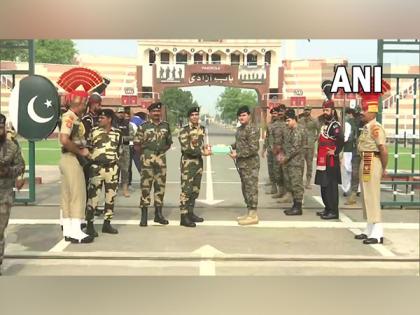 BSF, Pakistan Rangers exchange sweets at Attari-Wagah border on occasion of Eid Al-Adha | BSF, Pakistan Rangers exchange sweets at Attari-Wagah border on occasion of Eid Al-Adha BSF, Pakistan Rangers exchange sweets at Attari-Wagah border on occasion of Eid Al-Adha | BSF, Pakistan Rangers exchange sweets at Attari-Wagah border on occasion of Eid Al-Adha