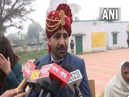 UP polls: Bridegroom casts vote ahead of his wedding in Muzaffarnagar | UP polls: Bridegroom casts vote ahead of his wedding in Muzaffarnagar UP polls: Bridegroom casts vote ahead of his wedding in Muzaffarnagar | UP polls: Bridegroom casts vote ahead of his wedding in Muzaffarnagar