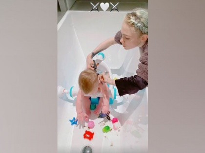 Grimes gives 8-month-old son X AE A-Xii a 'viking'-inspired haircut | Grimes gives 8-month-old son X AE A-Xii a 'viking'-inspired haircut