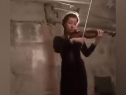Girl hiding in bomb shelter plays song by Ukrainian composer Mykola Lysenko | Girl hiding in bomb shelter plays song by Ukrainian composer Mykola Lysenko