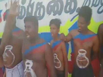 Tamil Nadu polls: Supporters of VCK candidate Shanavas paint pot symbol on bellies | Tamil Nadu polls: Supporters of VCK candidate Shanavas paint pot symbol on bellies