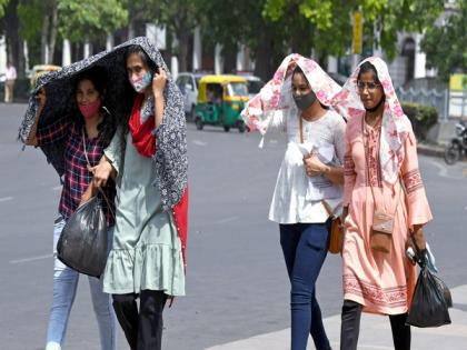 Delhi: IMD predicts heatwave for 3 days, western disturbance likely to bring down temperature from May 13 | Delhi: IMD predicts heatwave for 3 days, western disturbance likely to bring down temperature from May 13 Delhi: IMD predicts heatwave for 3 days, western disturbance likely to bring down temperature from May 13 | Delhi: IMD predicts heatwave for 3 days, western disturbance likely to bring down temperature from May 13