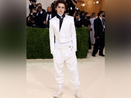 Timothee Chalamet makes his Met Gala debut in an all-white outfit and sneakers | Timothee Chalamet makes his Met Gala debut in an all-white outfit and sneakers