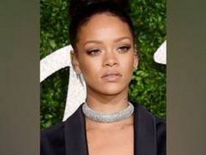 Netizens slam Rihanna for posting topless picture wearing Ganesha pendant | Netizens slam Rihanna for posting topless picture wearing Ganesha pendant