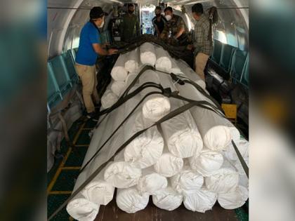 Combating COVID-19: IAF lifts raw materials for PPE production by DRDO | Combating COVID-19: IAF lifts raw materials for PPE production by DRDO