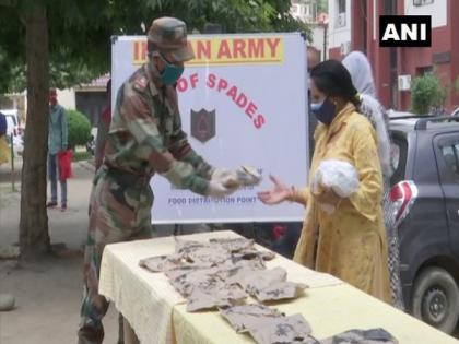 Army distributes food to needy in J-K's Rajouri | Army distributes food to needy in J-K's Rajouri