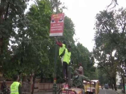 Dehradun civic body starts removing posters, banners of parties as poll code comes into force | Dehradun civic body starts removing posters, banners of parties as poll code comes into force
