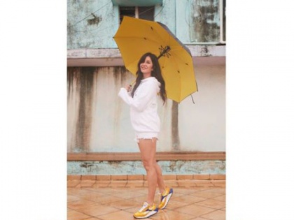 When it rains, I share my umbrella: Katrina Kaif poses in all-white ensemble | When it rains, I share my umbrella: Katrina Kaif poses in all-white ensemble