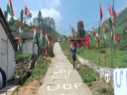 As Kerala readies for local body polls, flags of political parties adorn lush greenery of Munnar tea-estates | As Kerala readies for local body polls, flags of political parties adorn lush greenery of Munnar tea-estates