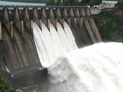 Srisailam reservoir nears capacity, five gates lifted 10 feet | Srisailam reservoir nears capacity, five gates lifted 10 feet