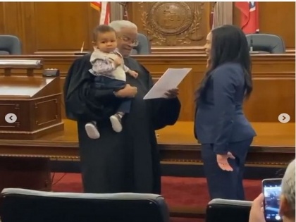 Mom takes oath to become lawyer while judge holds her baby, video goes viral | Mom takes oath to become lawyer while judge holds her baby, video goes viral