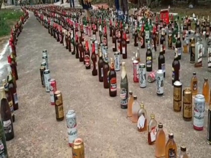 Andhra Pradesh police destroys illegal liquor bottles seized during raids | Andhra Pradesh police destroys illegal liquor bottles seized during raids
