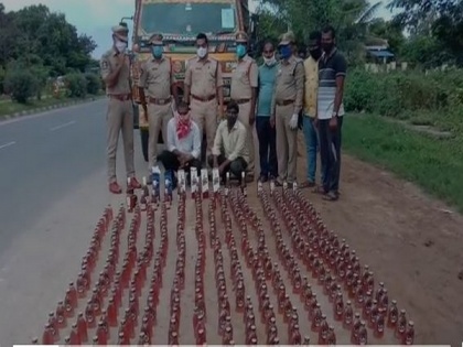 2 arrested in Andhra's Krishna for illegally transporting 423 liquor bottles | 2 arrested in Andhra's Krishna for illegally transporting 423 liquor bottles