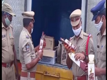 Two held for illegally transporting liquor bottles in Andhra Pradesh | Two held for illegally transporting liquor bottles in Andhra Pradesh