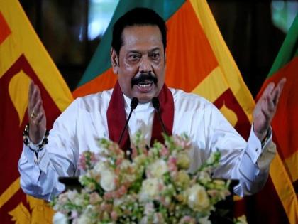 Protestors hoot at Sri Lanka PM during his temple visit | Protestors hoot at Sri Lanka PM during his temple visit