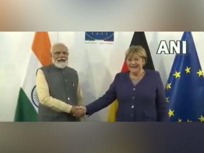 PM Modi meets German Chancellor Angela Merkel on sidelines of G20 Summit | PM Modi meets German Chancellor Angela Merkel on sidelines of G20 Summit