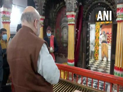 Amit Shah offers prayers at Varanasi's Sankat Mochan Temple | Amit Shah offers prayers at Varanasi's Sankat Mochan Temple