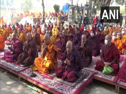 Buddhist monks offer prayers in Bihar temple for an end to COVID pandemic | Buddhist monks offer prayers in Bihar temple for an end to COVID pandemic