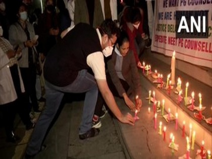 Doctors' Association holds candlelight march over delayed NEET-PG 2021 counselling | Doctors' Association holds candlelight march over delayed NEET-PG 2021 counselling