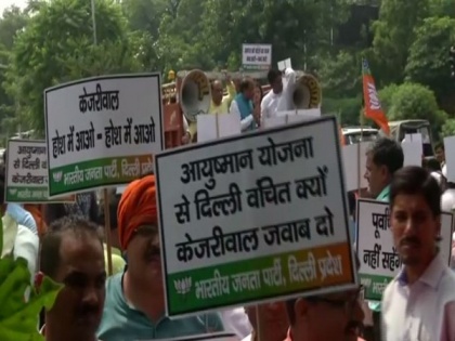 Delhi BJP protests against Kejriwal over 'outsider' remark | Delhi BJP protests against Kejriwal over 'outsider' remark