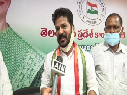 TRS and BJP working together to loot Telangana and its people, says Cong's Revanth Reddy | TRS and BJP working together to loot Telangana and its people, says Cong's Revanth Reddy
