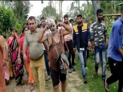 Assam: Sexual harassment accused made to walk through village wearing garland of shoes | Assam: Sexual harassment accused made to walk through village wearing garland of shoes