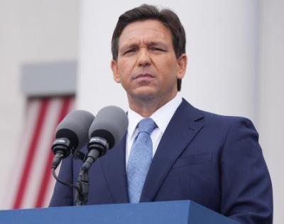 Florida Governor booed at vigil for racial attack victims | Florida Governor booed at vigil for racial attack victims Florida Governor booed at vigil for racial attack victims | Florida Governor booed at vigil for racial attack victims